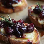 Crispy Crostini with Balsamic Roasted Cranberries and Brie